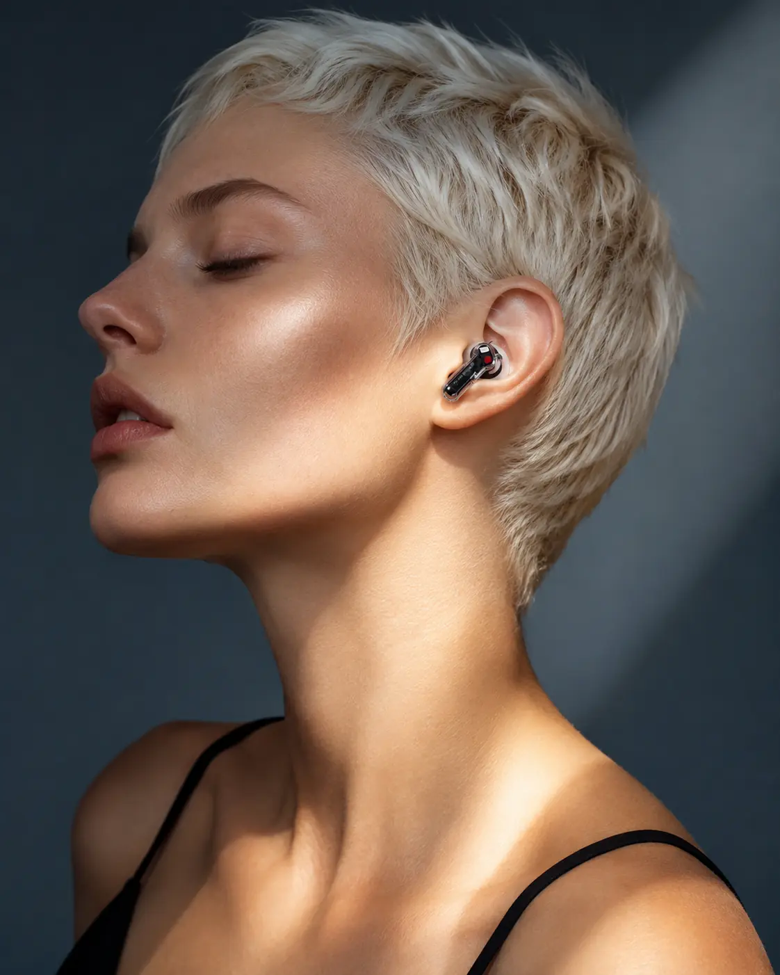 Profile portrait with a transparent wireless earbud