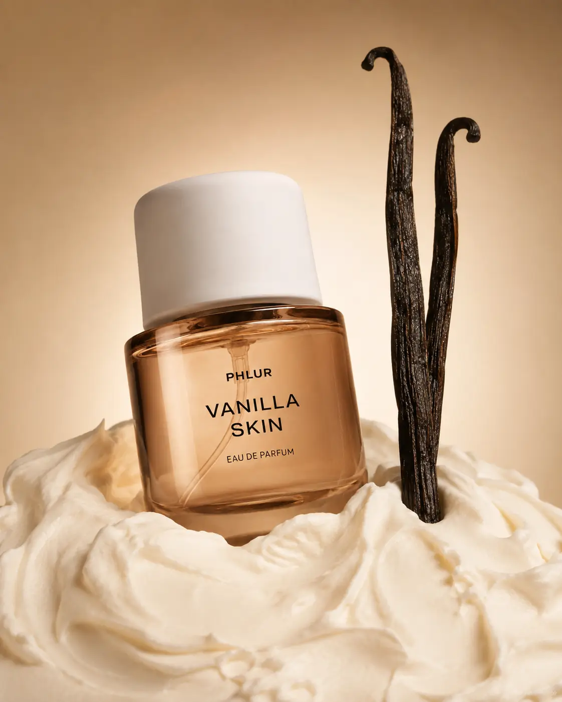 Fragrance bottle styled with vanilla pods and whipped cream