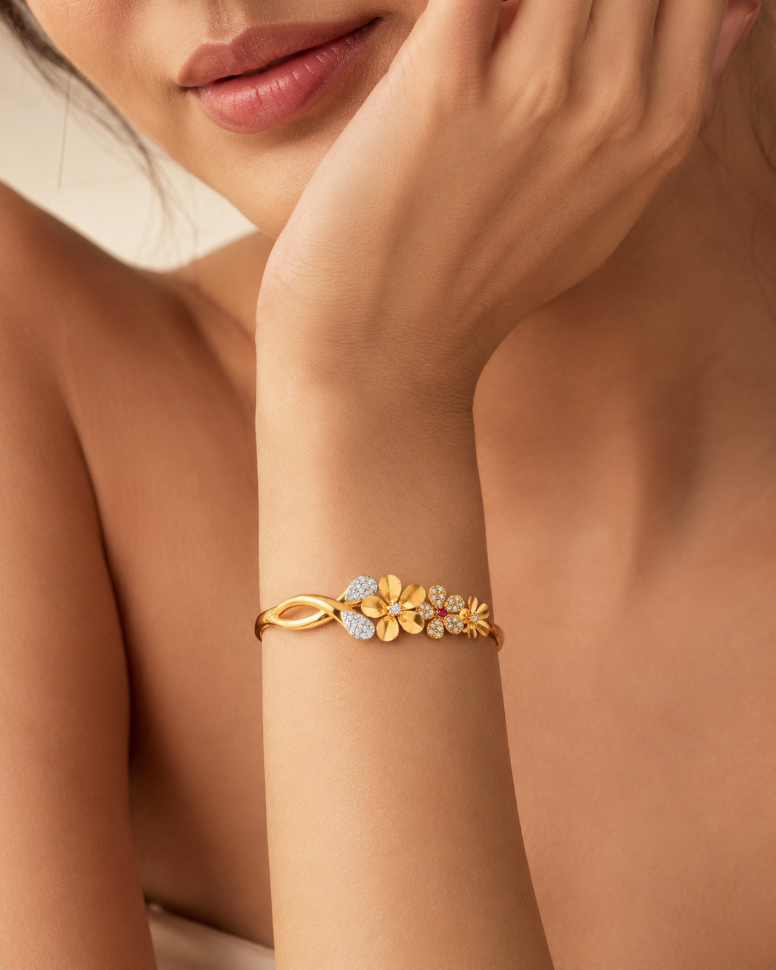 Editorial close-up of a floral gold and diamond bracelet